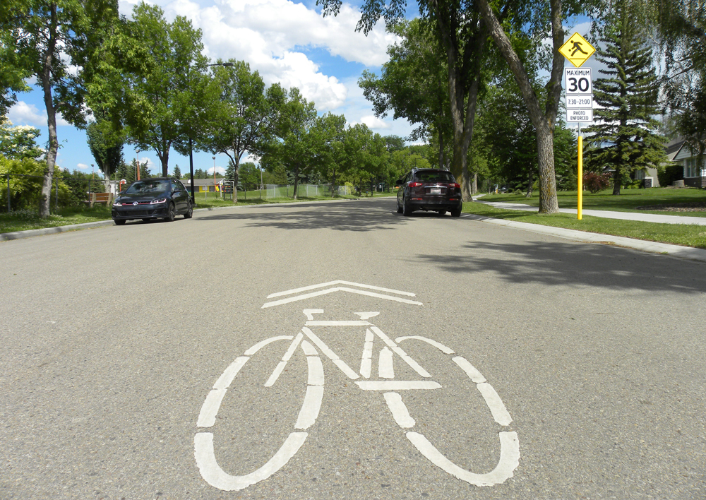 Sharrows should be in the middle of the road so motorists see them as well © David Arminas, Edmonton, Canada