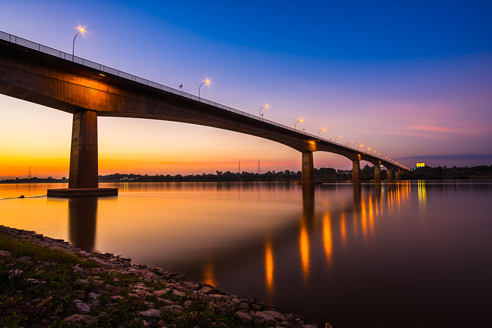 International links between Lao PDR and its neighbours, such as the bridge spanning the Mekong River and connecting with Thailand, are crucial for transport © Songdech Kothmongkol | Dreamstime.com