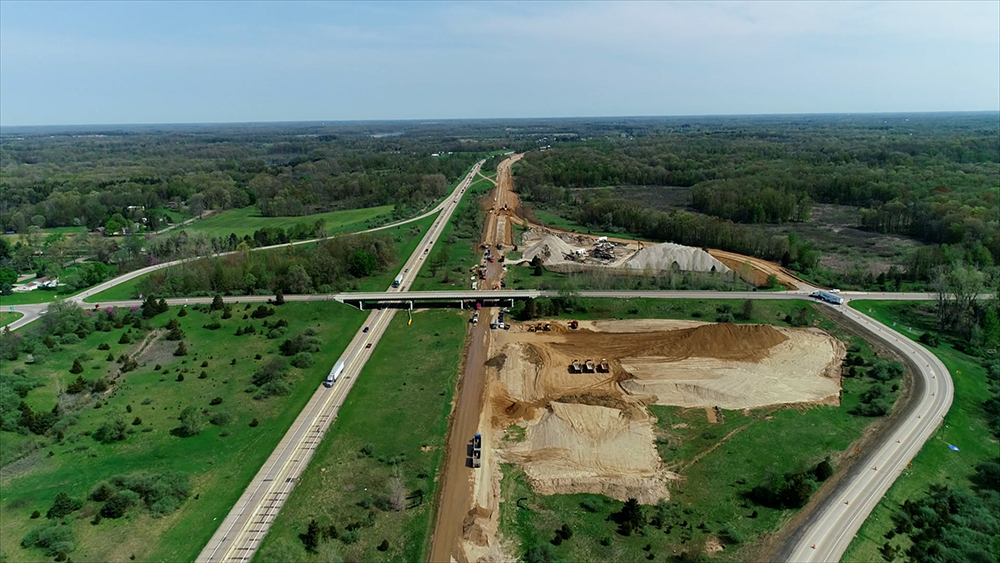 The I-69 improvement project is being carried out for MDOT, with Michigan Paving & Materials as prime contractor and Hoffman Bros as earthworks contractor