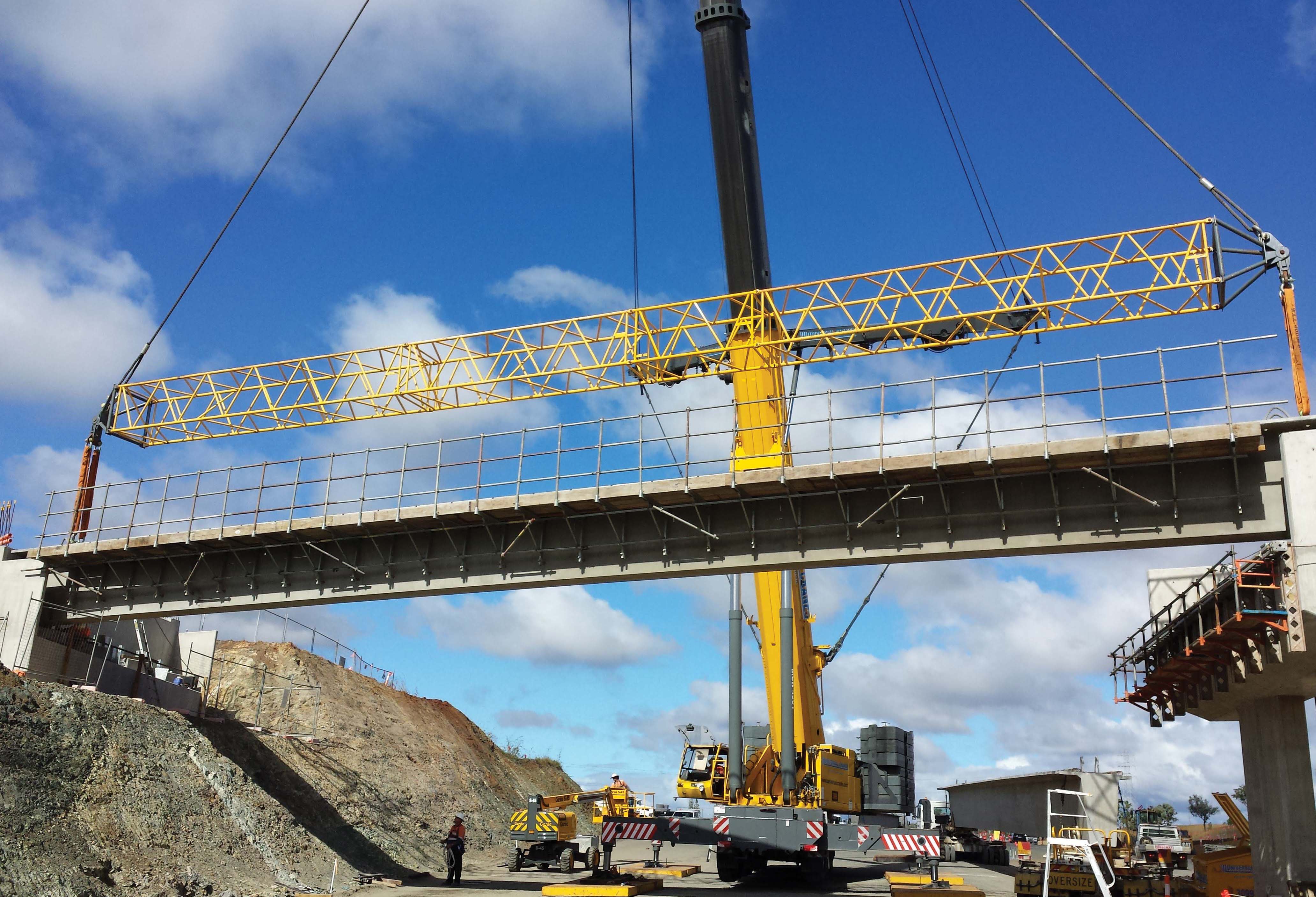 Manitowoc cranes constructing a bridge 