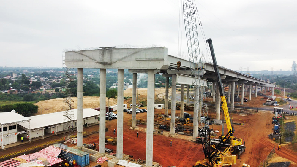 The deck for the viaduct sections sits on precast beams raised into position 