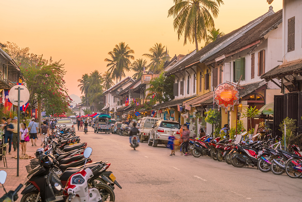 Small capacity motorcycles and scooters are predominant for urban personal transport in Lao PDR, as in many Southeast Asian nations  © F11photo | Dreamstime.com