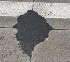 Macismo International suits repairs of pothole