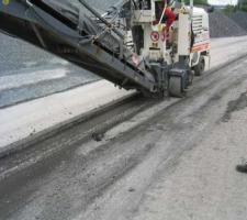 Milling the asphalt surface course incorporating HaTelit