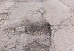 potholes on a road 