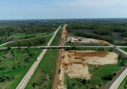 The I-69 improvement project is being carried out for MDOT, with Michigan Paving & Materials as prime contractor and Hoffman Bros as earthworks contractor