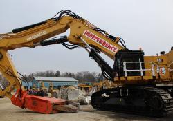 Caterpillar dealer Cleveland Brothers has modified a Cat 6015 excavator for use in heavy-duty demolition works